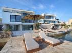 Luxurious seafront villa in Tivat with yacht dock and pool