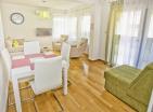 Charming sea-adjacent 79 m2 apartment in Dobrota with terrace