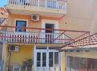 Exclusive working mini-hotel with 10 rooms in Đenovići for sale next to the sea