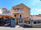 Exclusive working mini-hotel with 10 rooms in Đenovići for sale next to the sea