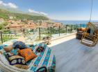 Stunning sea view 102 m2 penthouse in Bečići with spacious terrace next to sea