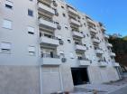 Sea view 45 m2 apartment in a new build in Budva 8 min to the beach