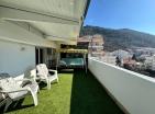 Charming Budva 55 m2 apartment with terrace and mountain views